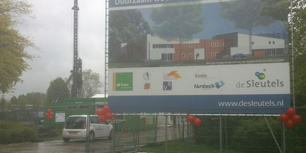 1ste paal in de regen